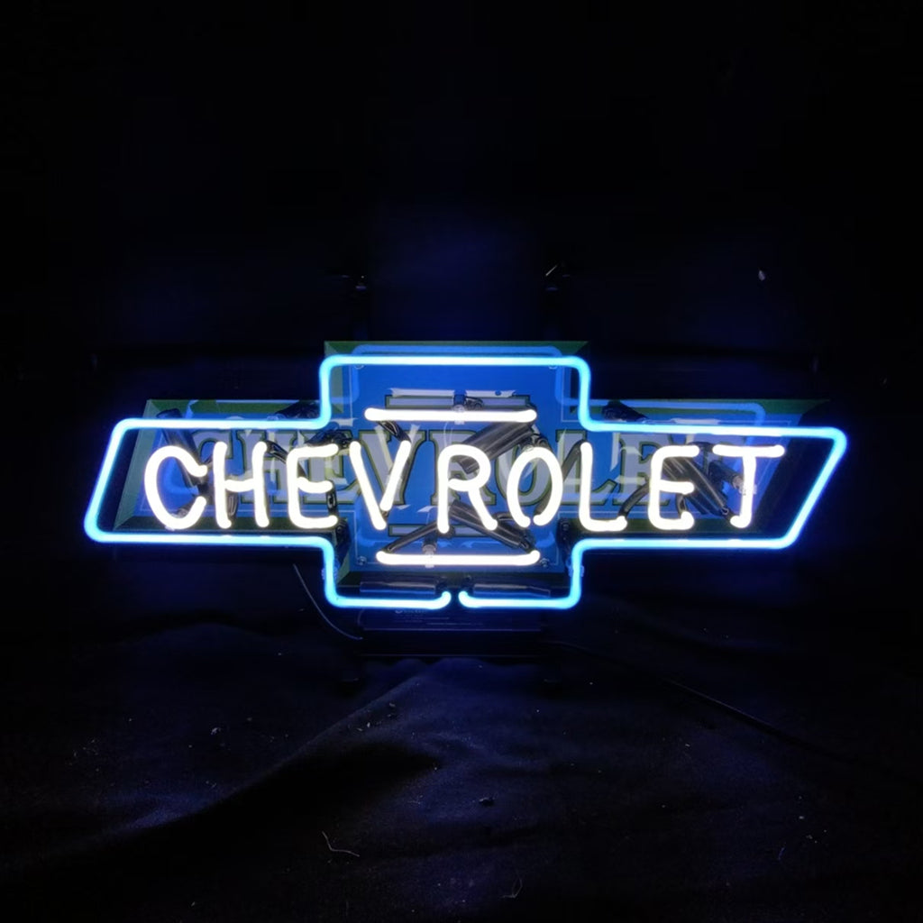 "Genuine Chevrolet logo neon sign with glowing blue bowtie emblem and 'Chevrolet' script in classic font, handmade with glass tubes"
