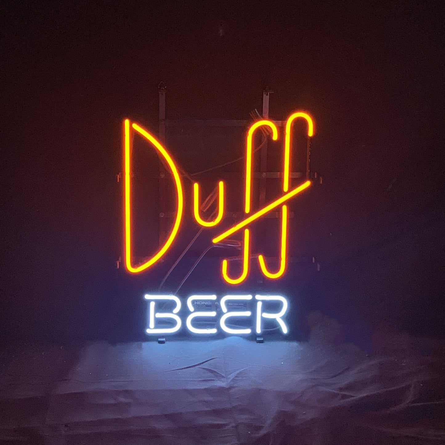 "Duff Beer neon sign glass - bright and vibrant logo, perfect for bars, game rooms, and man caves."