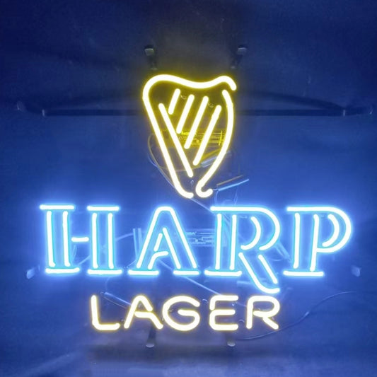 The Harp Lager neon sign features a handcrafted real glass harp on top, with an outlined 'Harp' in neon font and 'Lager' in neon lettering at the bottom.