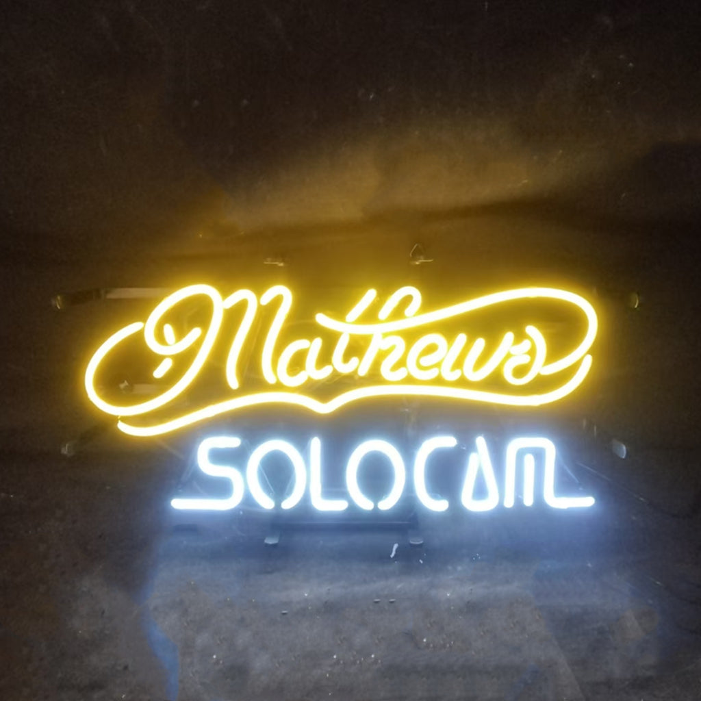 "Mathew Solocom neon sign glass- perfect for garages, man caves, shops. Eye-catching on wall and window"