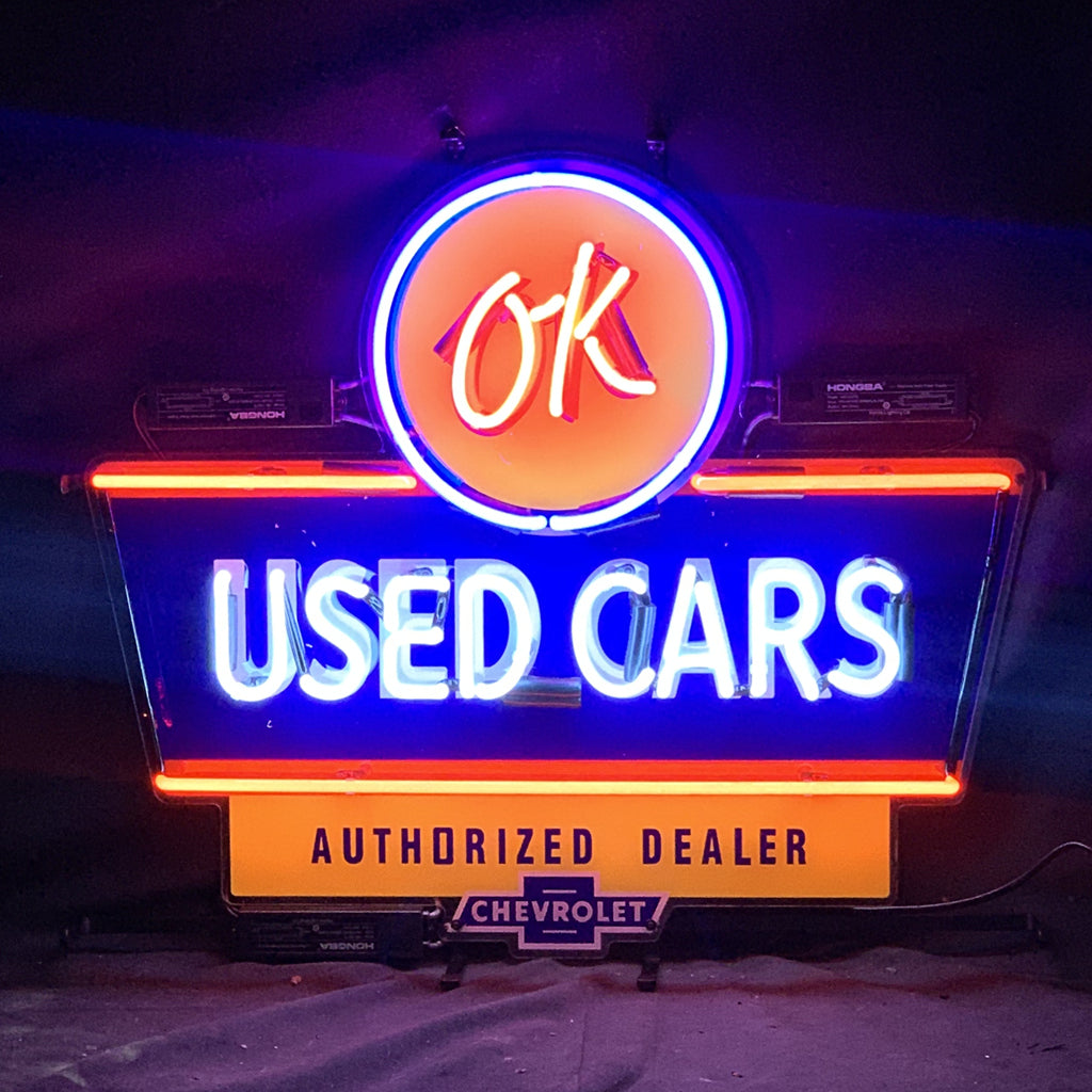 “OK Used Cars Authorized Dealer Chevrolet neon sign glass - sleek and stylish, perfect for garages, man caves, and auto enthusiasts.”