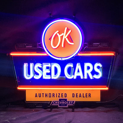 “OK Used Cars Authorized Dealer Chevrolet neon sign glass - sleek and stylish, perfect for garages, man caves, and auto enthusiasts.”